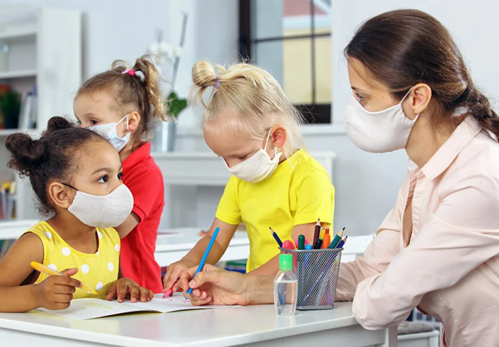 children at childcare with masks